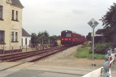 DSB MR class photographed in Gadbjerg, Jutland, 2. August 1981.  The MR class was purchased from 1978 to 1985 in a number of 98. The first 30 was built by Uerdingen in Germany, the rest by Scandia in Denmark. Dieselhydraulic Deutz engine. 325 hp. Max speed 120 km/h - 75 mph. Length each unit 22 335 mm. Weight 34,5 metric tonnes. One trainset consists of two units. In 1995 - 1997 renovated and painted in a white/red colourscheme. Increased max. speed to 130 km/h - 81 mph.